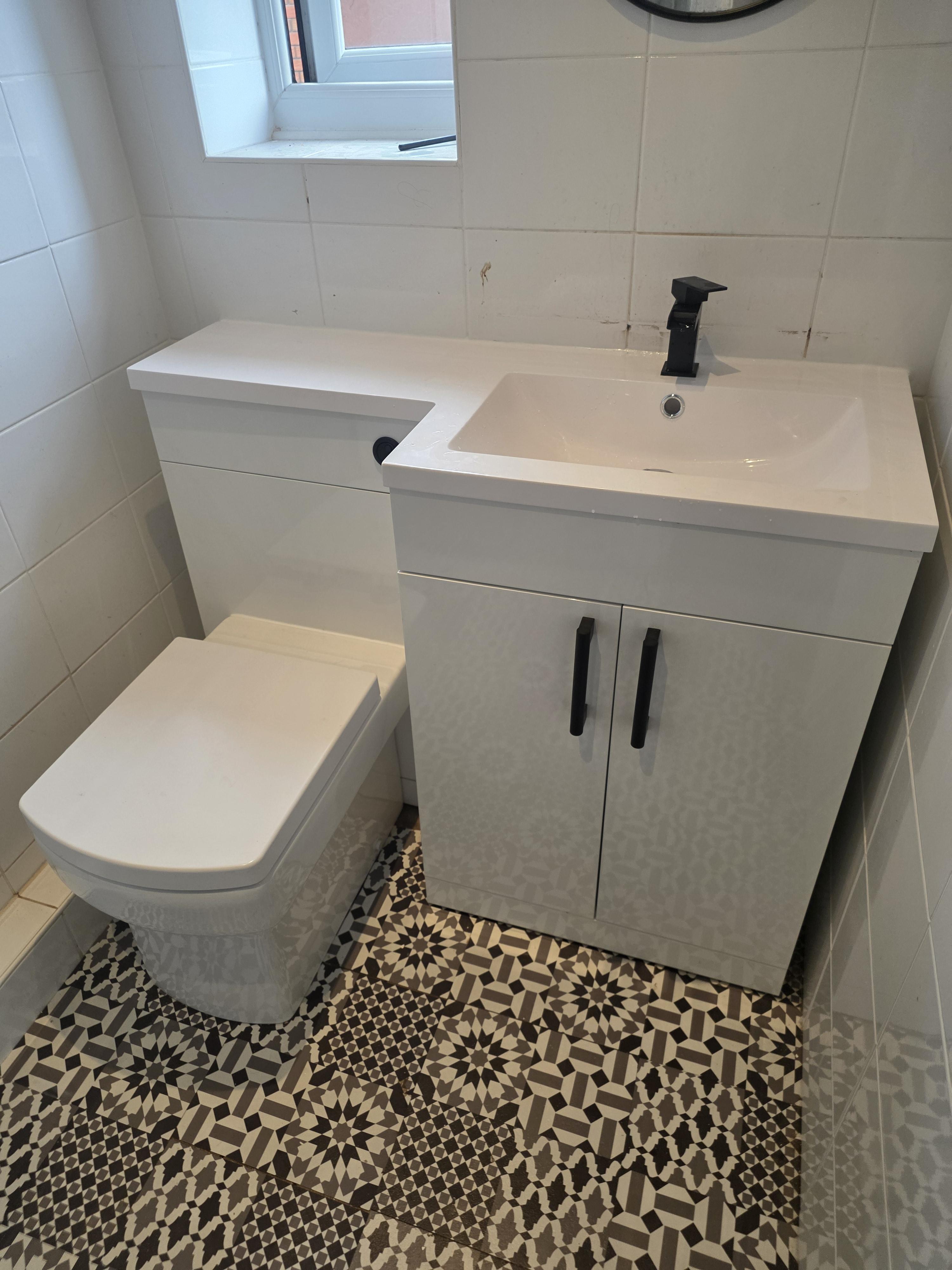 Kitchen cabinet with sockets and USB charging assembly 